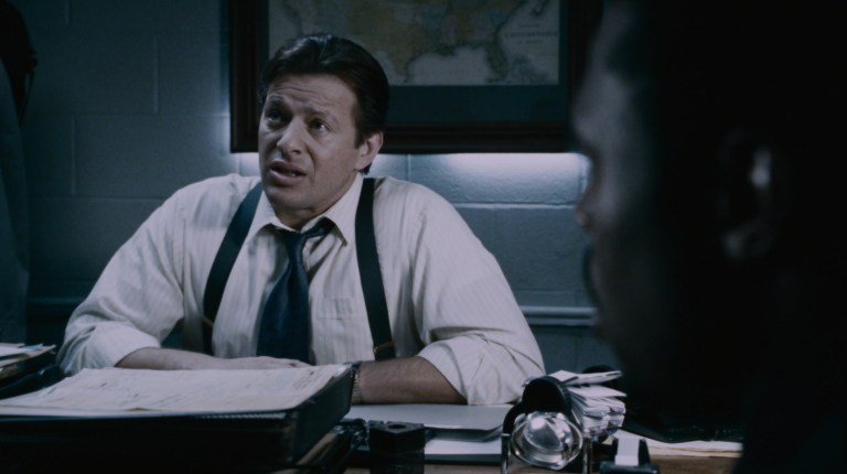 Hoffman lies for Rigg in Saw IV (2007).