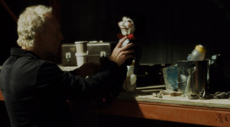 Jigsaw with Bobby in Saw IV (2007).