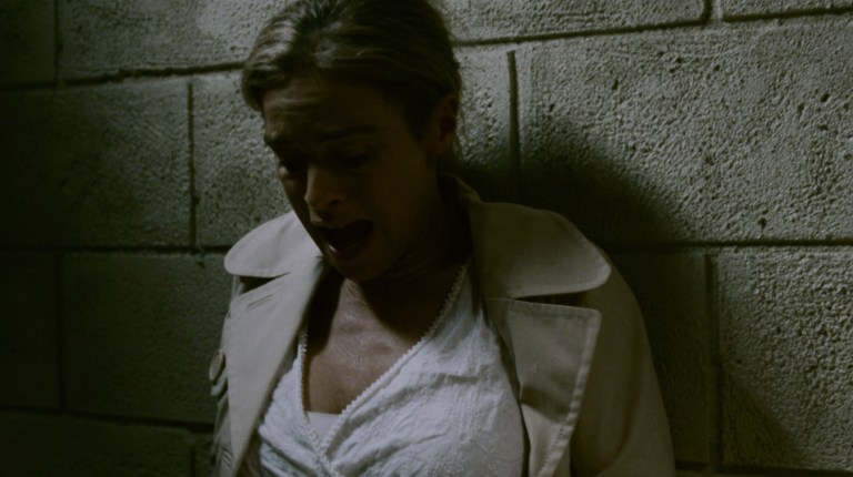 Jill cries out in pain in Saw IV (2007).