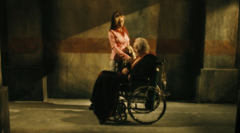 Jill Tuck with John Kramer in Saw VI (2009).