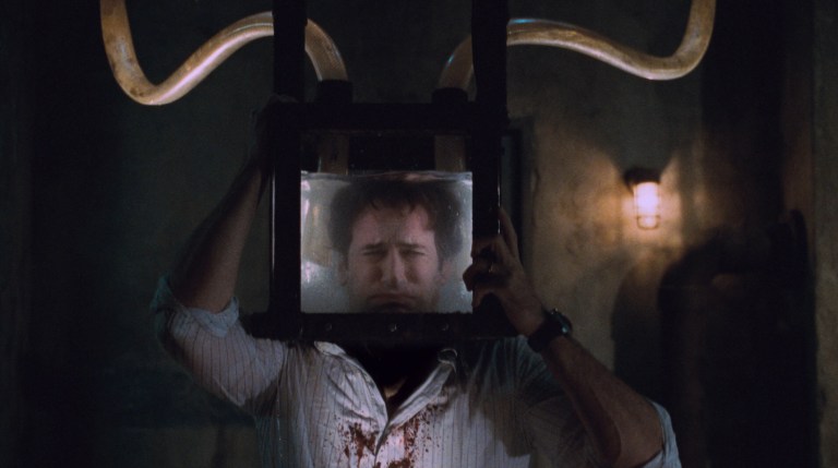 Peter Strahm being drowned in Saw V (2008).