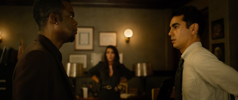 Zeke and Emmerson/Schenks meet in Captain Garza's office in Spiral (2021).