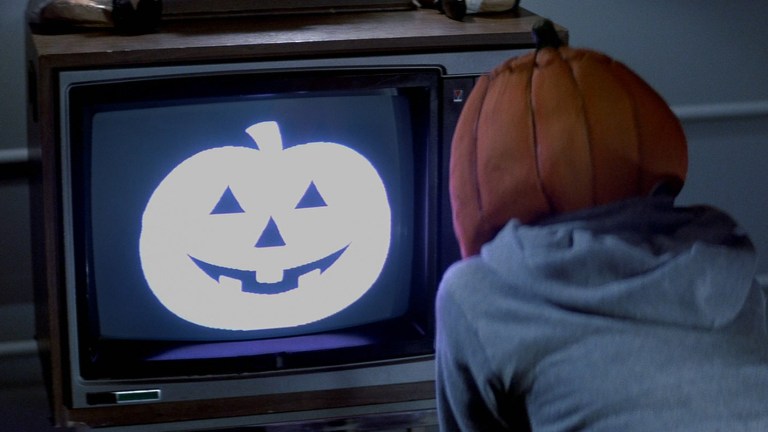 A kid watching TV in Halloween III: Season of the Witch (1982).
