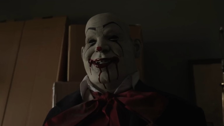 A creepy clown mannequin in Hall House LLC Origins (2023).