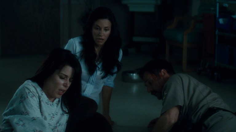 Neve Campbell, Courteney Cox, and David Arquette in Scream 4 (2011).