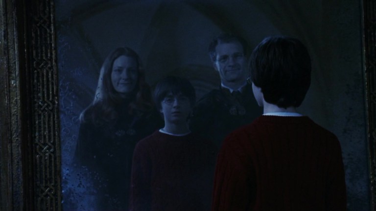 Harry sees his parents in the Mirror of Erised in Harry Potter and the Sorcerer's Stone (2001).