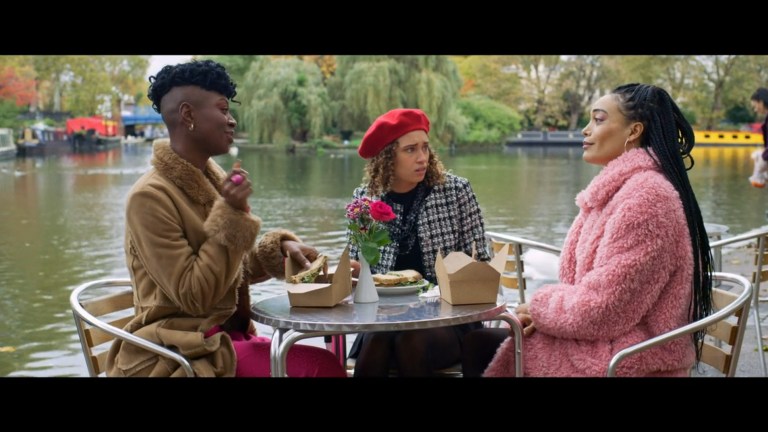 Miriam-Teak Lee, Ella-Rae Smith, and Cassie Clare have lunch outdoors in My Bloody Galentine (2024).