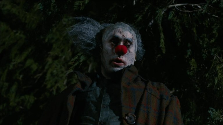Ross Noble as a killer clown in Stitches (2012).