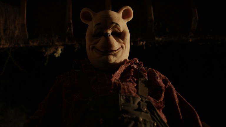 Pooh smiles in Winnie-the-Pooh: Blood and Honey (2023).