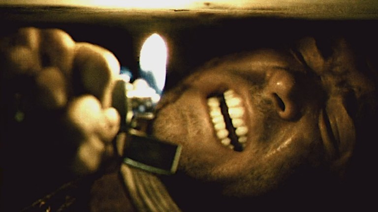 Ryan Reynolds plays a man buried in a coffin in Buried (2010).
