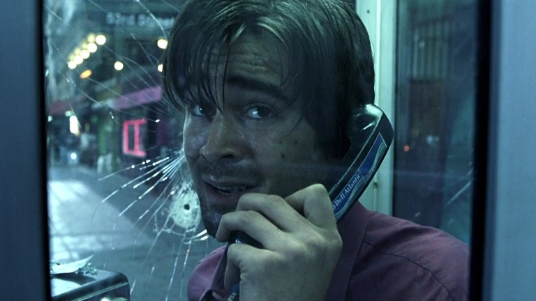 Colin Farrell plays a man trapped in a phone booth by a sniper in Phone Booth (2002).