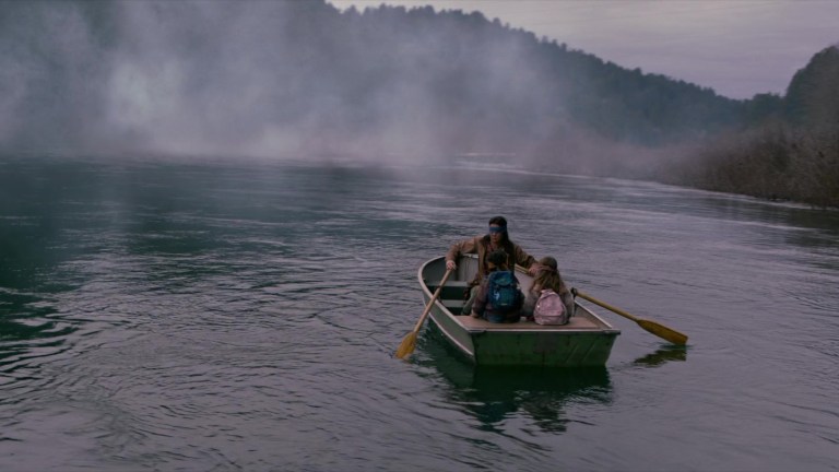 Malorie rows blindfolded with two children (2018).