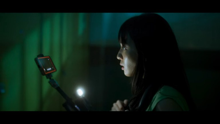 Wang Yu-xuan as Ting in The Bridge Curse: Ritual (2023).