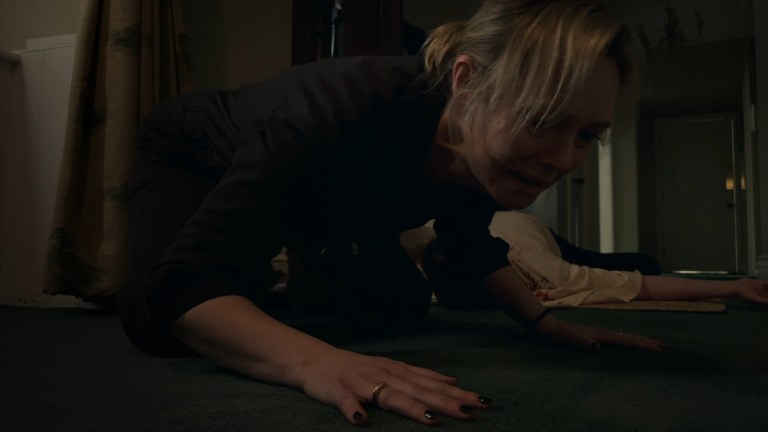 Tori tries to get up from the floor in Dagr (2024).