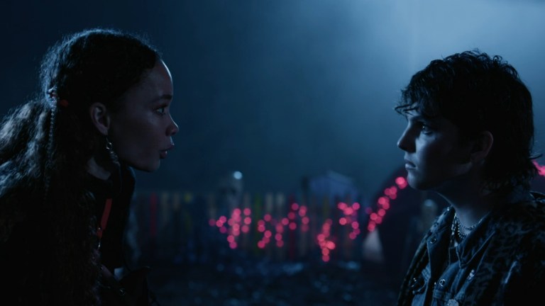 Ash and Iris discuss their feelings among a field full of the dead in Festival of the Living Dead (2024).
