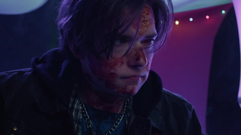 Christian Rose with a bloody face in Festival of the Living Dead (2024).