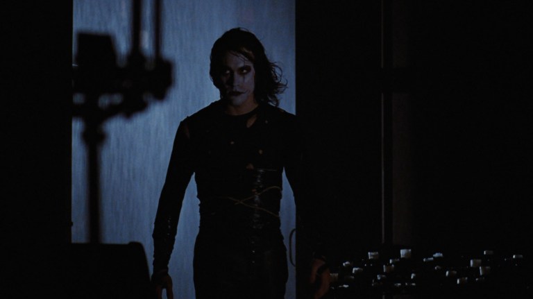 Eric Draven walks into a church in The Crow (1994).