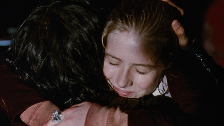 Sarah receives a hug from Eric in The Crow (1994).