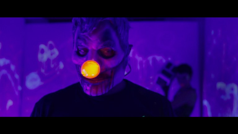 A clown with a light-up nose in Faceless After Dark (2023).