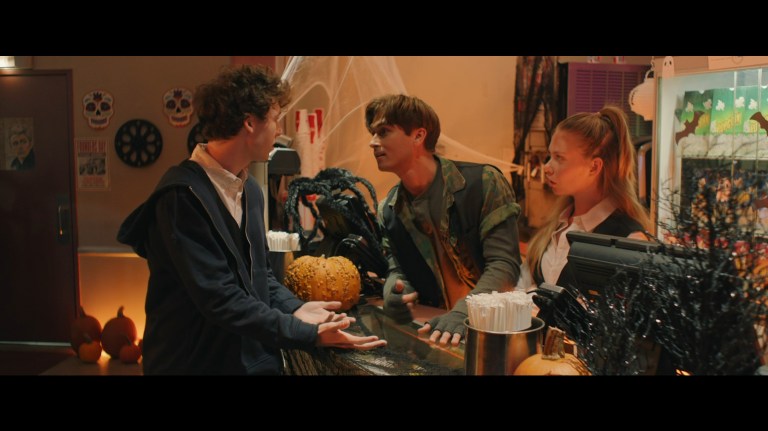 Devin Druid, Tyler James White, and Emilia McCarthy in Founders Day (2024).