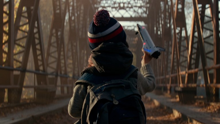 Beau plays with a toy space shuttle in A Quiet Place (2018).