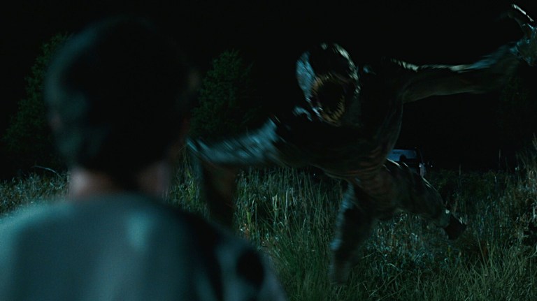 A creature attacks Lee in A Quiet Place (2018).