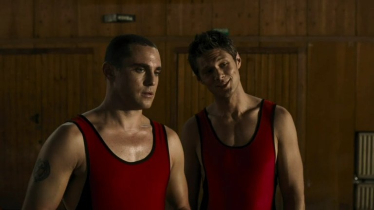 Two wrestlers in Train (2008).