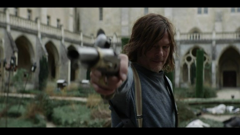 Daryl Dixon holds a gun in the character's Walking Dead spinoff.