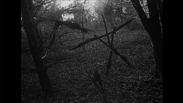 Mysterious constructions hang from the trees in The Blair Witch Project (1999).