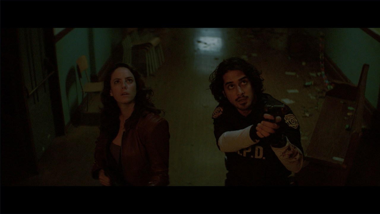 Kaya Scodelario and Avan Jogia as Claire Redfield and Leon S. Kennedy in Resident Evil: Welcome to Raccoon City