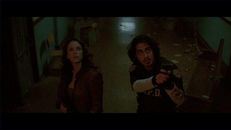 Kaya Scodelario and Avan Jogia as Claire Redfield and Leon S. Kennedy in Resident Evil: Welcome to Raccoon City