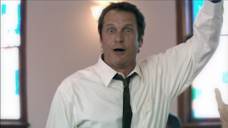 Reverend Cotton Marcus makes a funny face while giving a sermon in The Last Exorcism (2010).