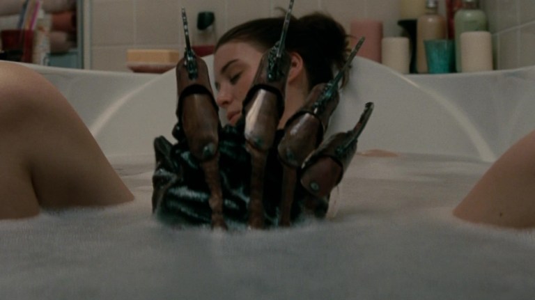 Freddy's glove reaches out of Nancy's bathtub in A Nightmare on Elm Street (2010).