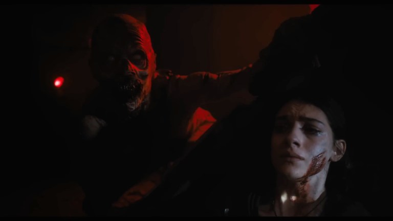 Clover hides from a wendigo in Until Dawn (2025).
