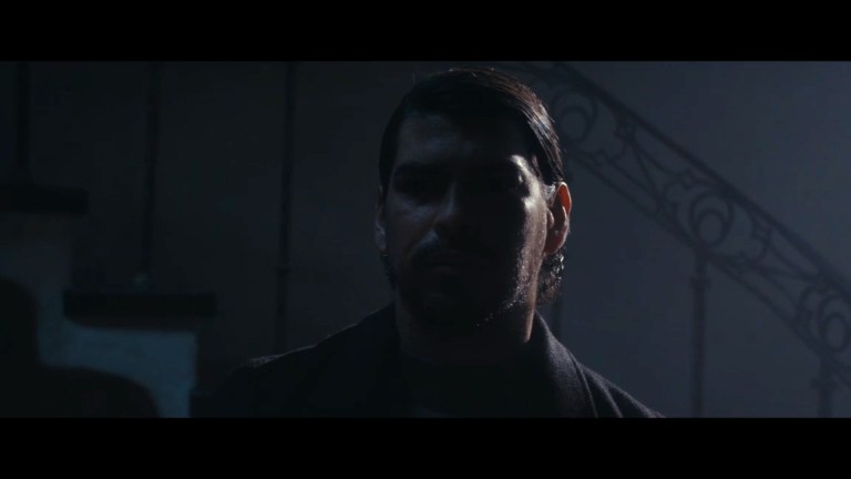 Raúl Castillo as The Client in Push (2024).