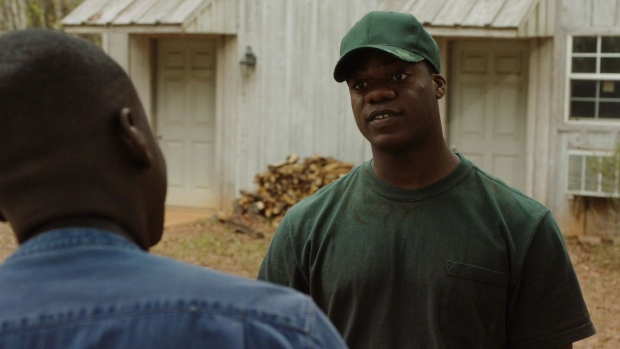 Marcus Henderson in Get Out (2017).