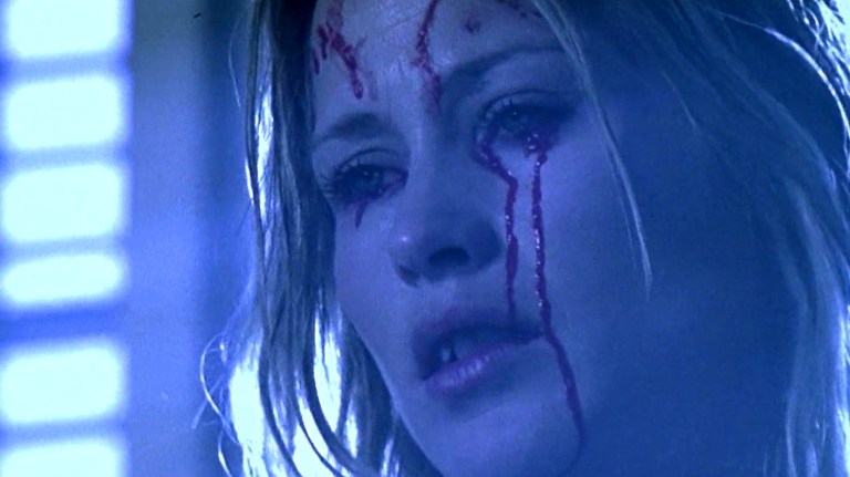 Patricia Arquette stars in Stigmata (1999).