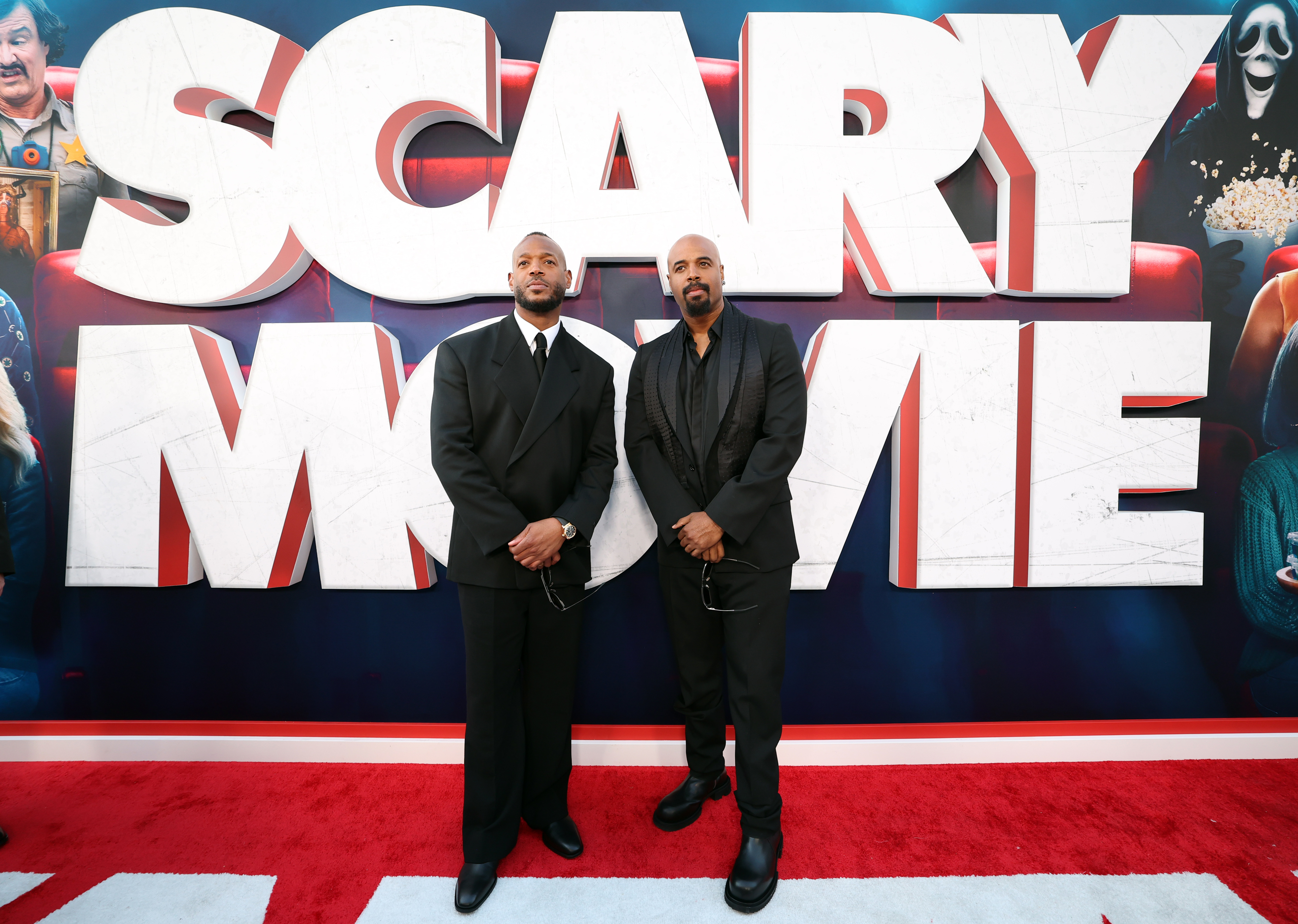 Marlon Wayans and Shawn Wayans standing together at the Scary Movie global premiere at Paramount Pictures Studios
