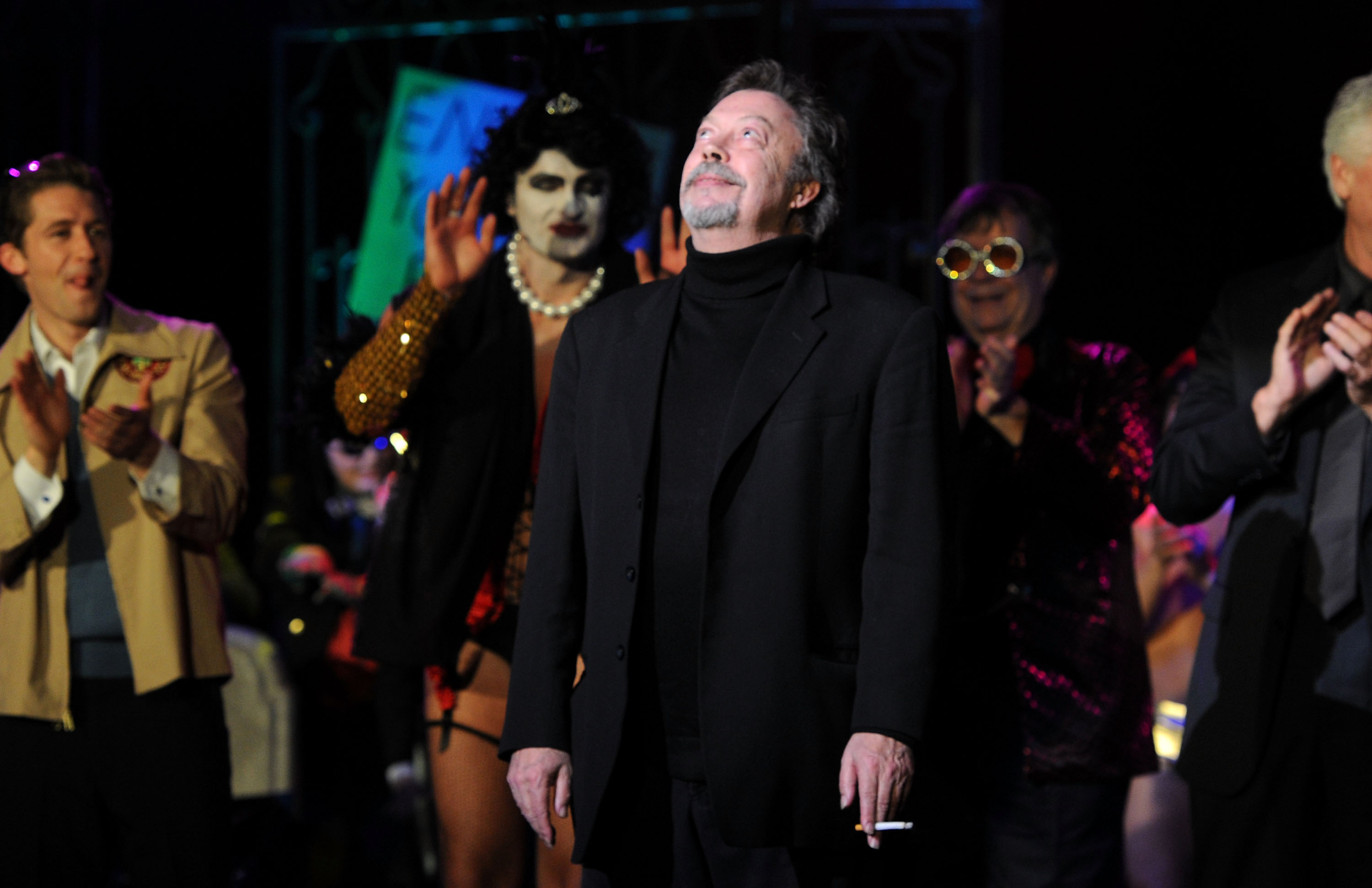 Tim Curry performing onstage at The Wiltern in Los Angeles at the Rocky Horror Picture Show 35th anniversary benefit event