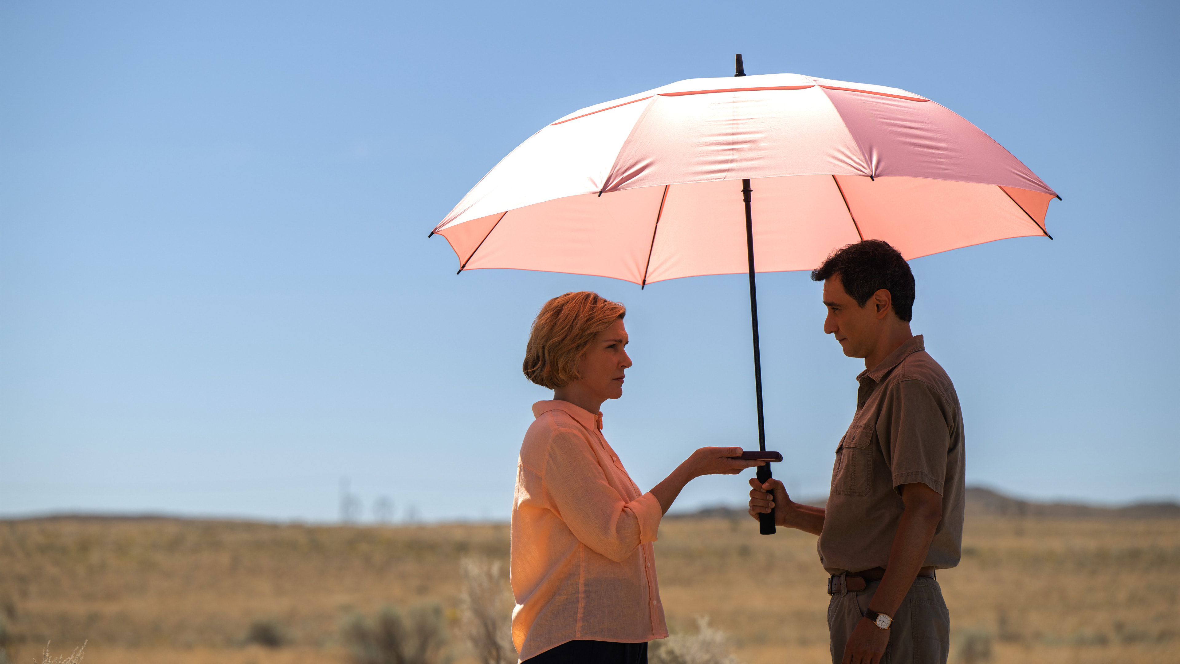Rhea Seehorn and Carlos Manuel Vesga in a scene from Pluribus Season 1 on Apple TV
