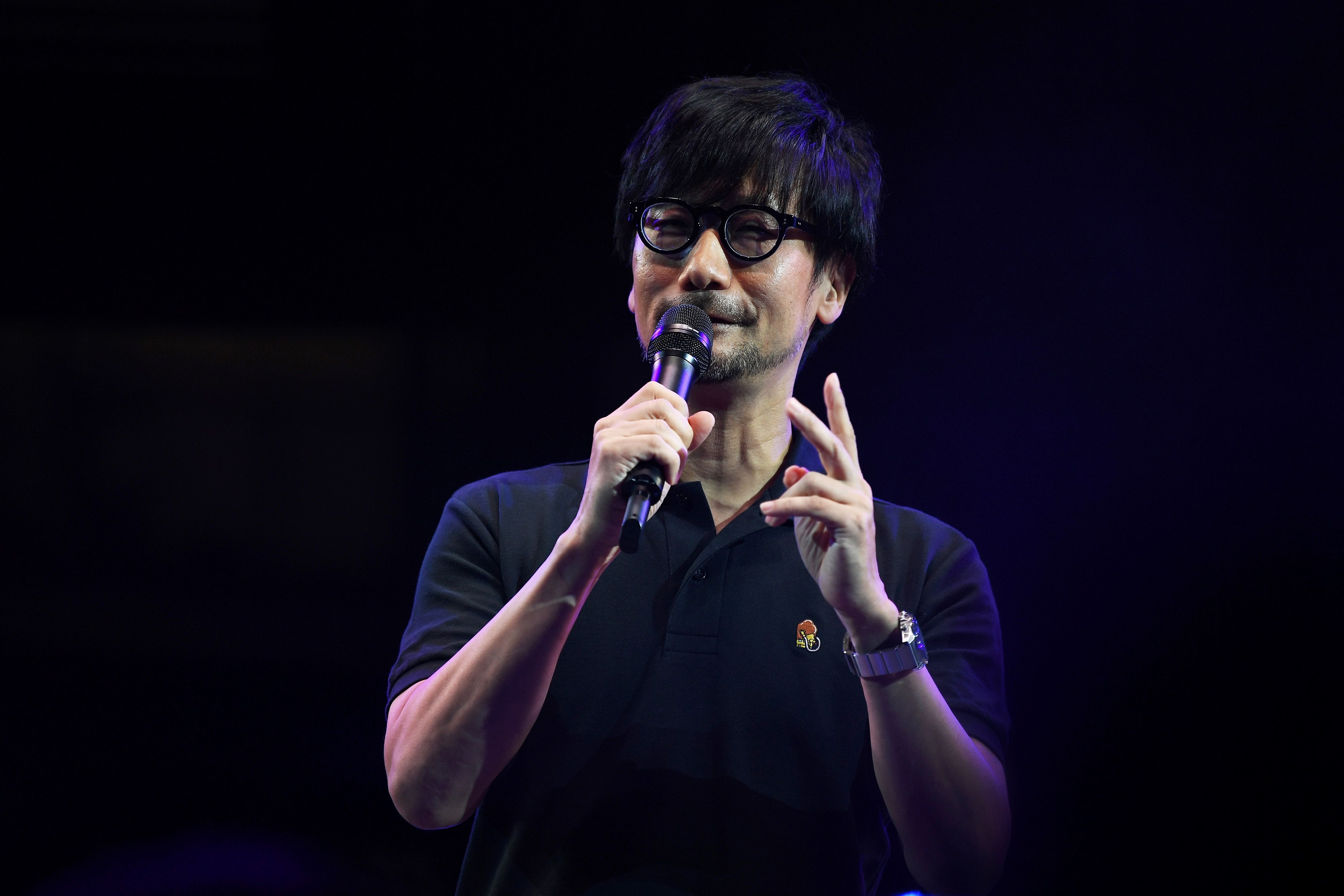 Hideo Kojima speaking on stage at the Tokyo Game Show in Makuhari, Chiba Prefecture