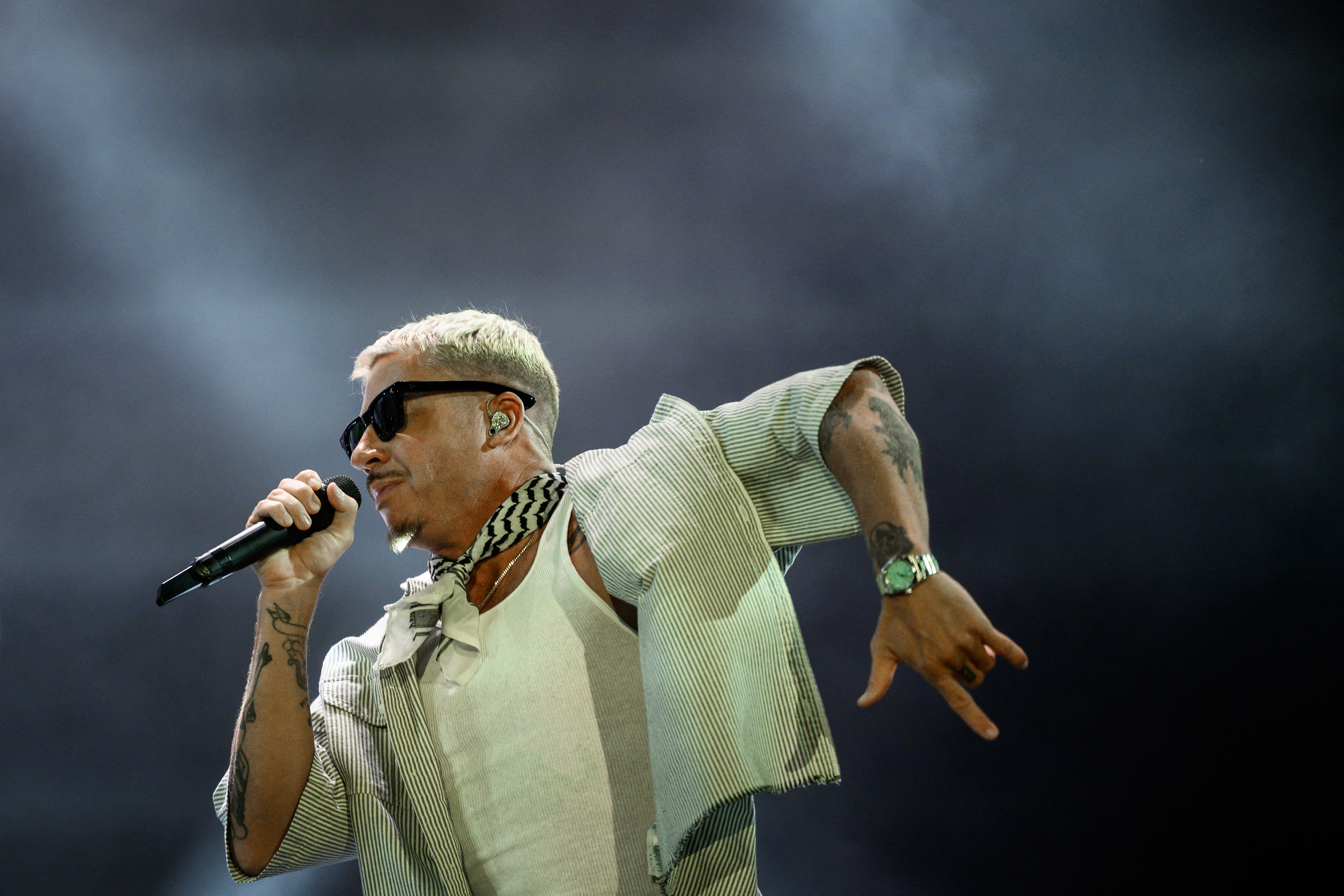 Macklemore performing on stage at the Goldencoast Rap Festival in Corcelles-les-Monts, France