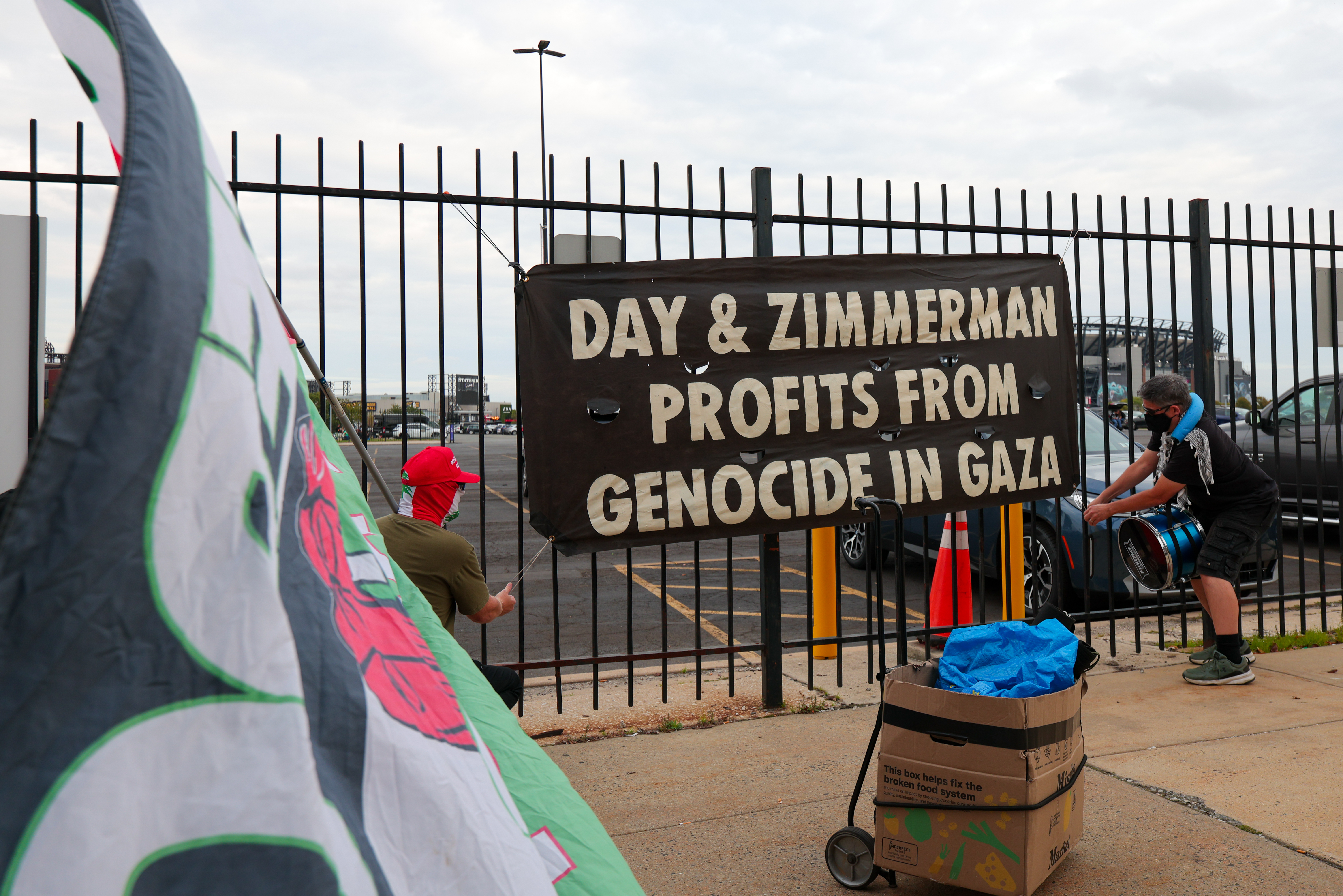 Pro-Palestinian protesters demonstrating outside Lincoln Financial Field in Philadelphia before an Ed Sheeran concert