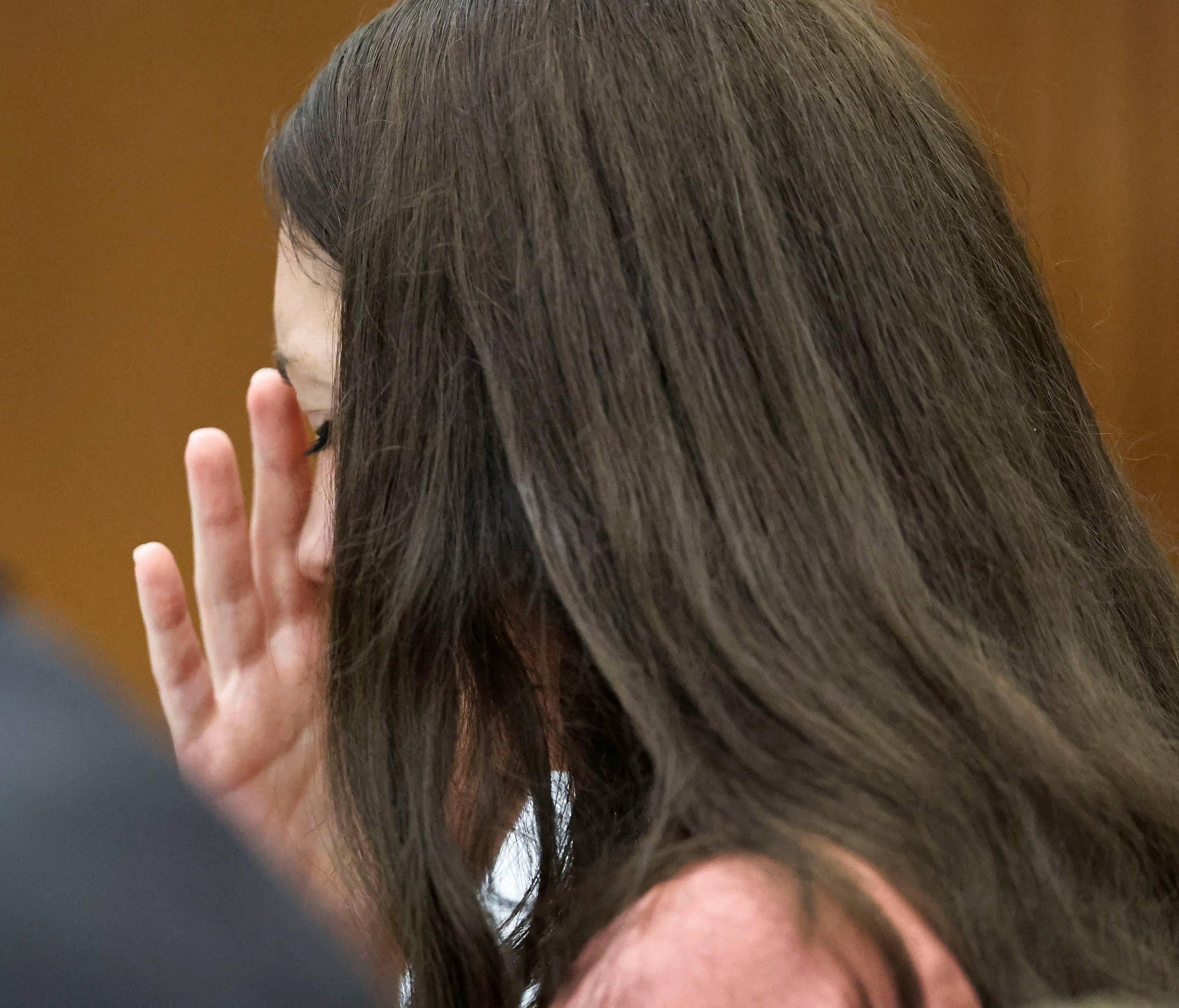 Lindsay Clancy seated in a courtroom during her murder trial at Plymouth Superior Court