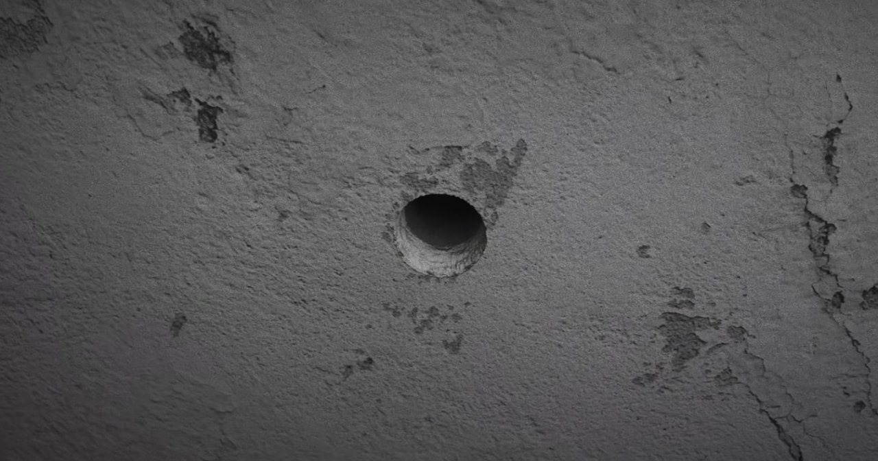 A Man Is Hired to Observe a Hole in a Basement Wall and Document Any Abnormalities in 'Head Like a Hole', Now Available on VOD