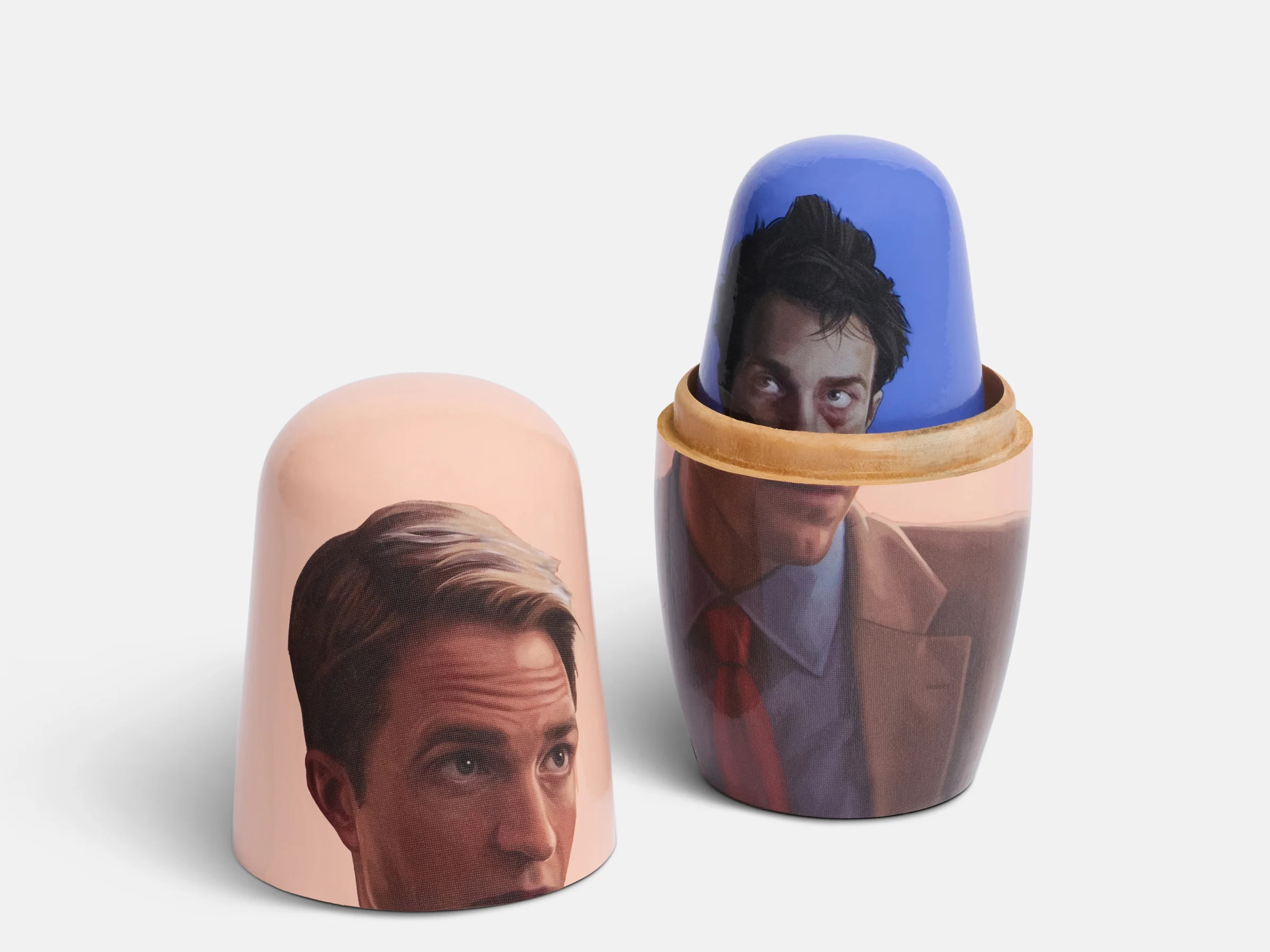 A24 nesting doll set featuring six painted wooden figures of Robert Pattinson's film roles