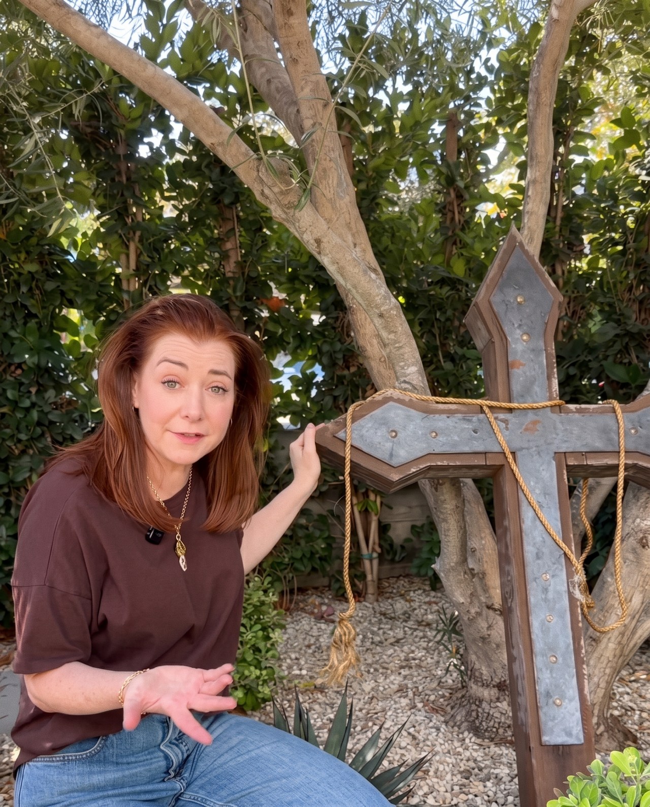 Alyson Hannigan's outdoor Halloween graveyard display with tombstones and props from Buffy the Vampire Slayer