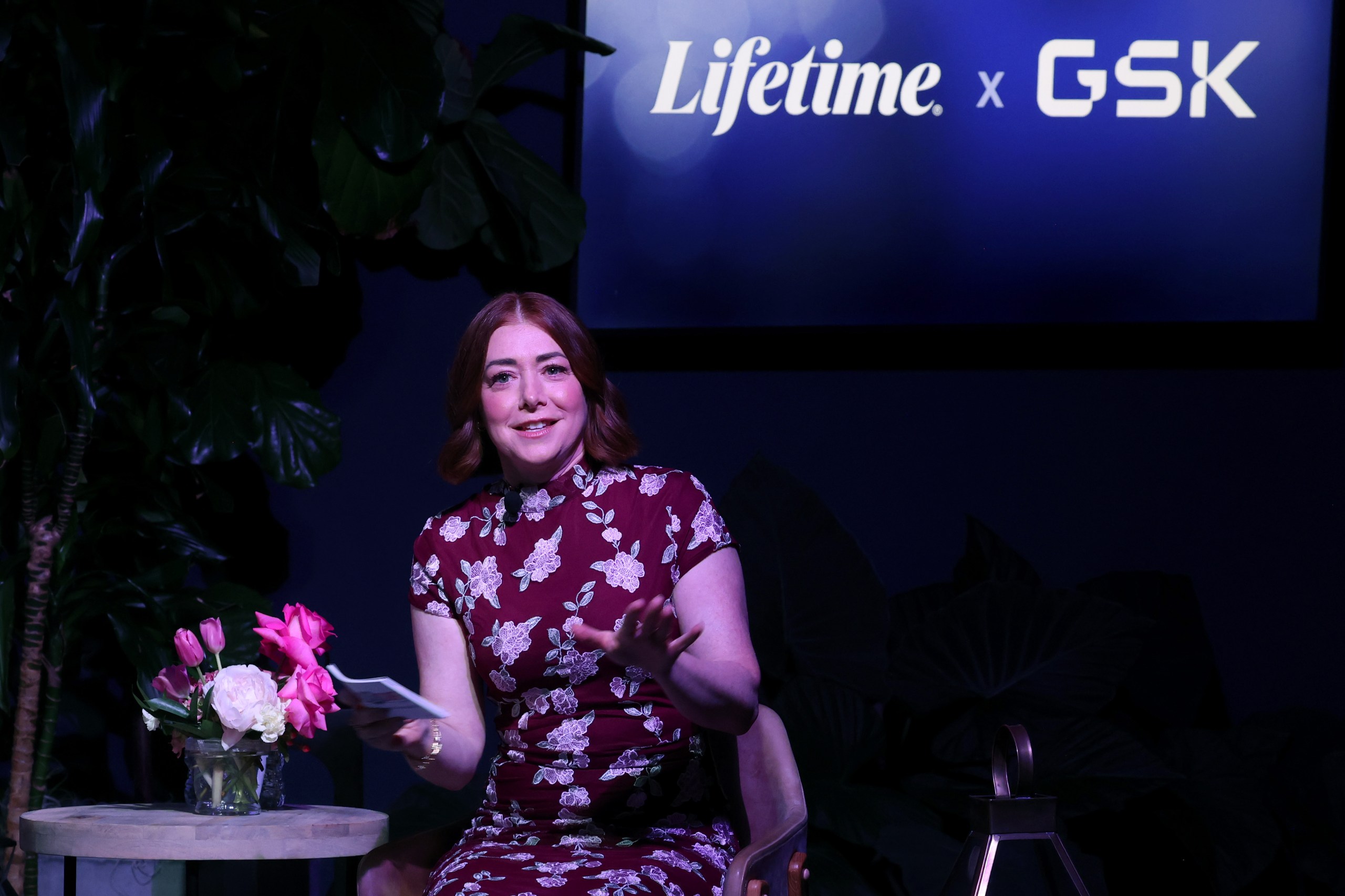 Alyson Hannigan speaking onstage at a movie premiere event in Los Angeles