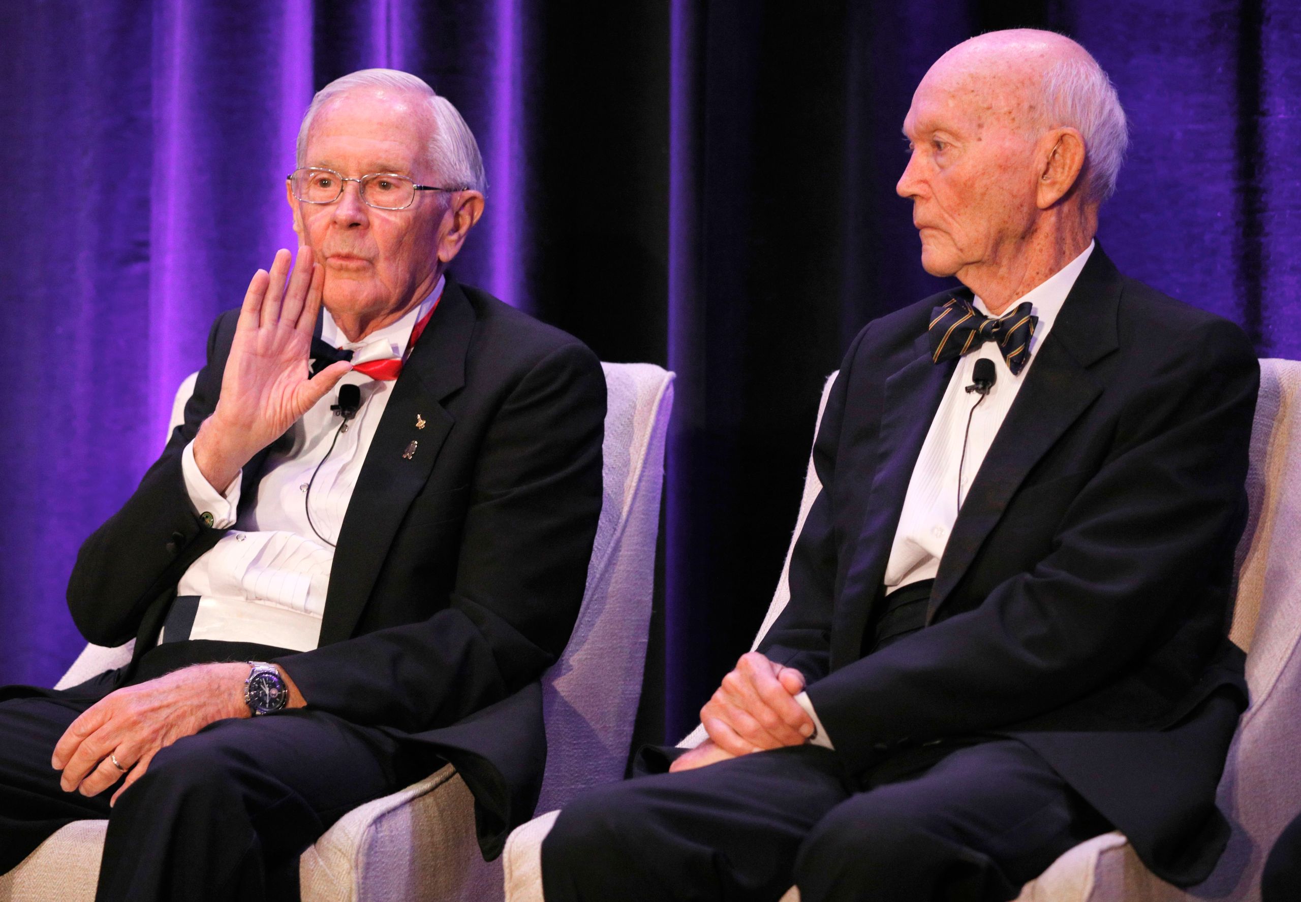 Charlie Duke and Michael Collins seated together at the Legends of Apollo media event in Cocoa Beach, Florida, July 2019
