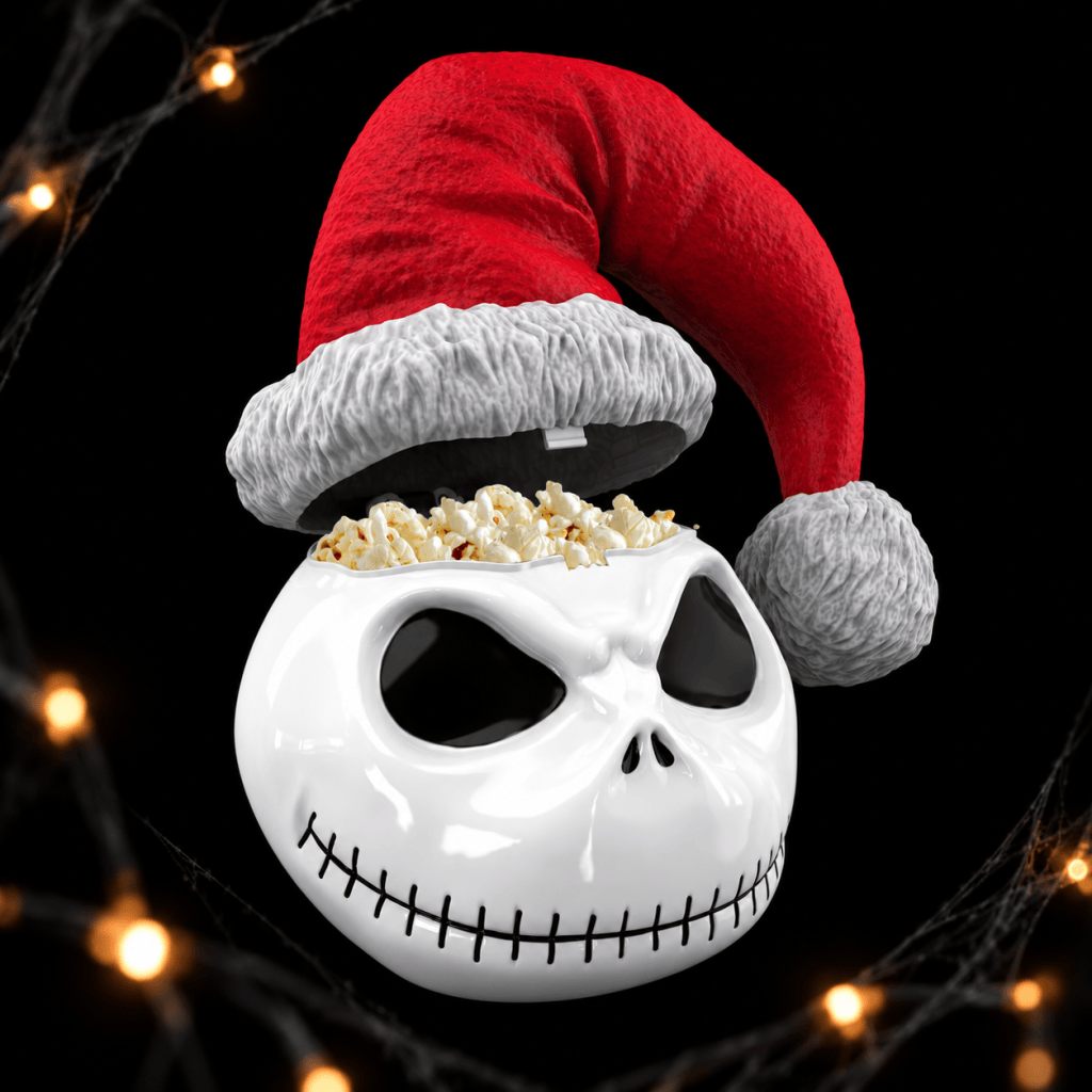 Jack Skellington figural popcorn bucket wearing a red-and-white Santa hat, with a light-up face feature